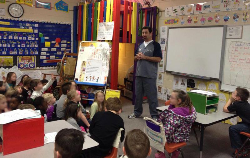 Dr. Steven P. Ray presenting annual 