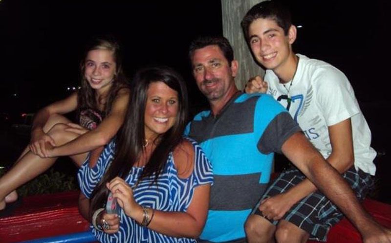 Dr. Ray with his wife and kids 