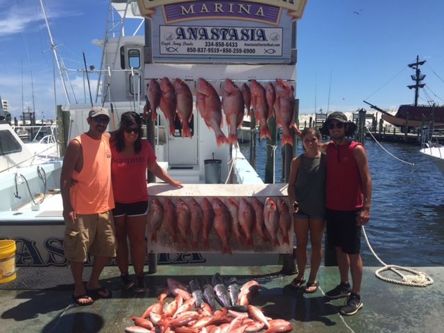 Dr. Ray fishing with his family 